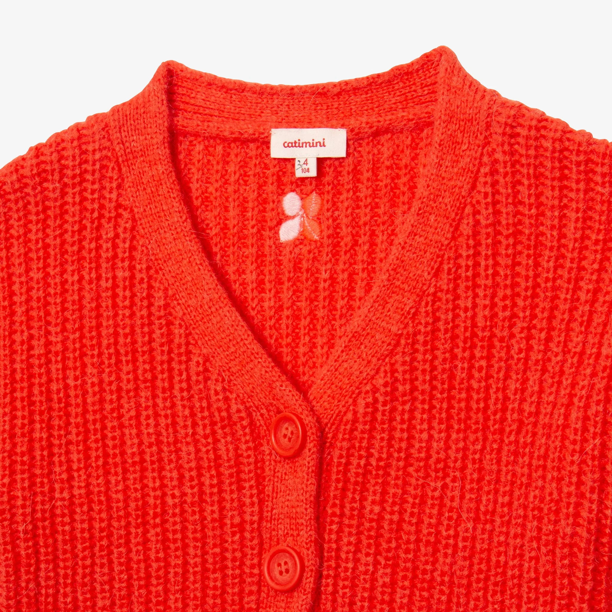 Girl's fluffy orange cardigan